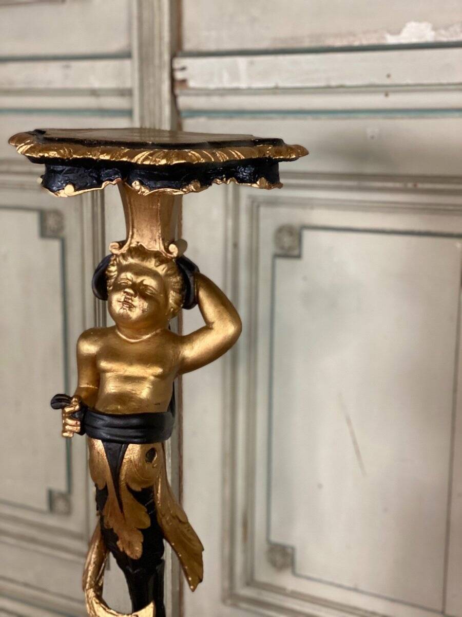 Pair of carved wooden pedestals, black and gold patina circa 1900