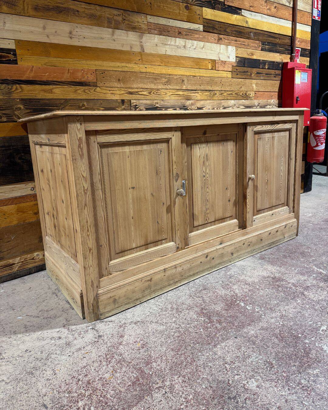 Old haberdashery counter in pitch pine