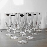 Ensemble de 12 flûtes à champagne, modèle “Versailles”, Cristal d’arques, 70’s.
