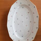 Oval dishes in floral porcelain and gold