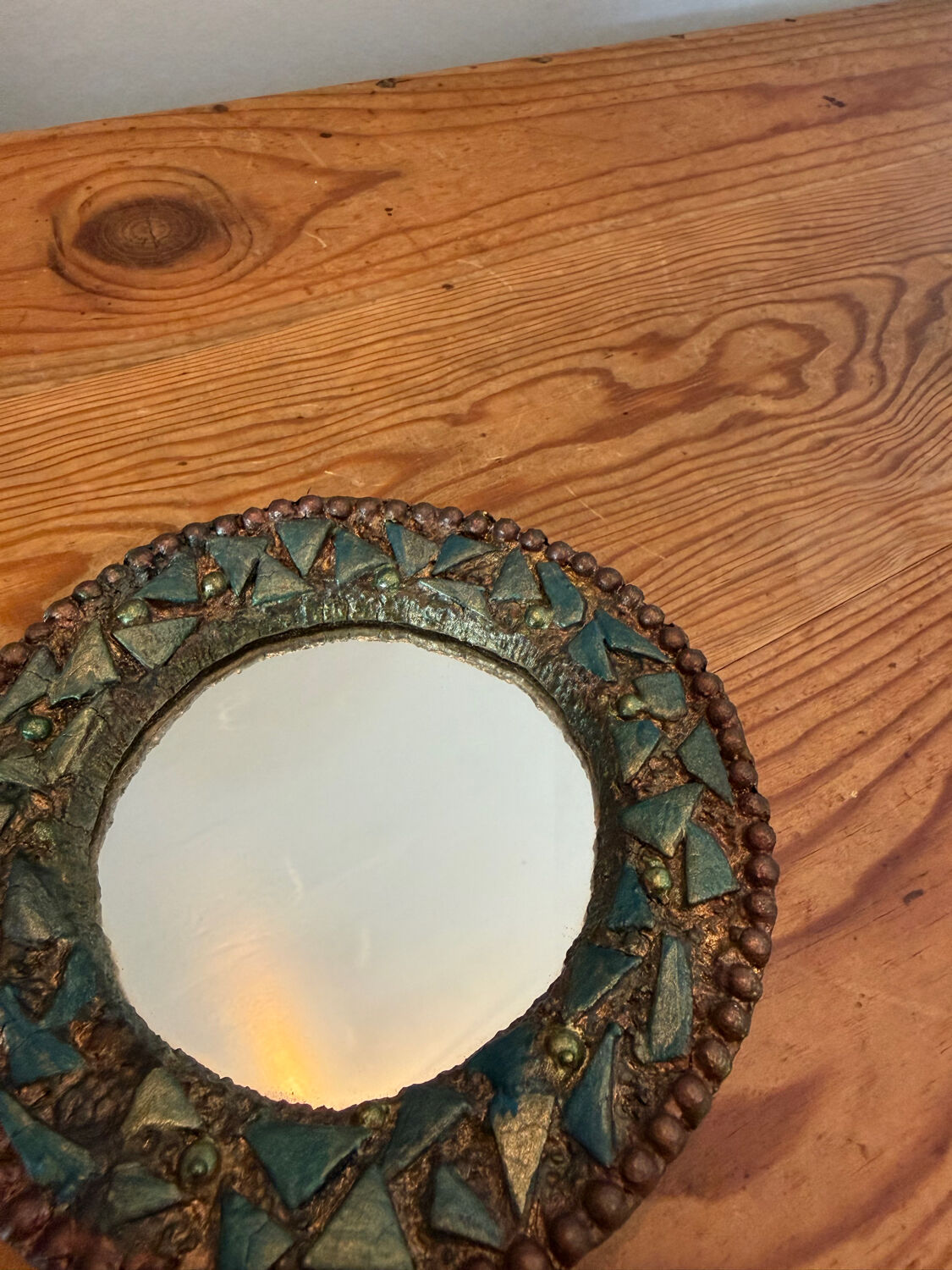 Round mirror in gilded enamelled ceramic with inlay