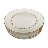 Porcelain plates with gold motifs