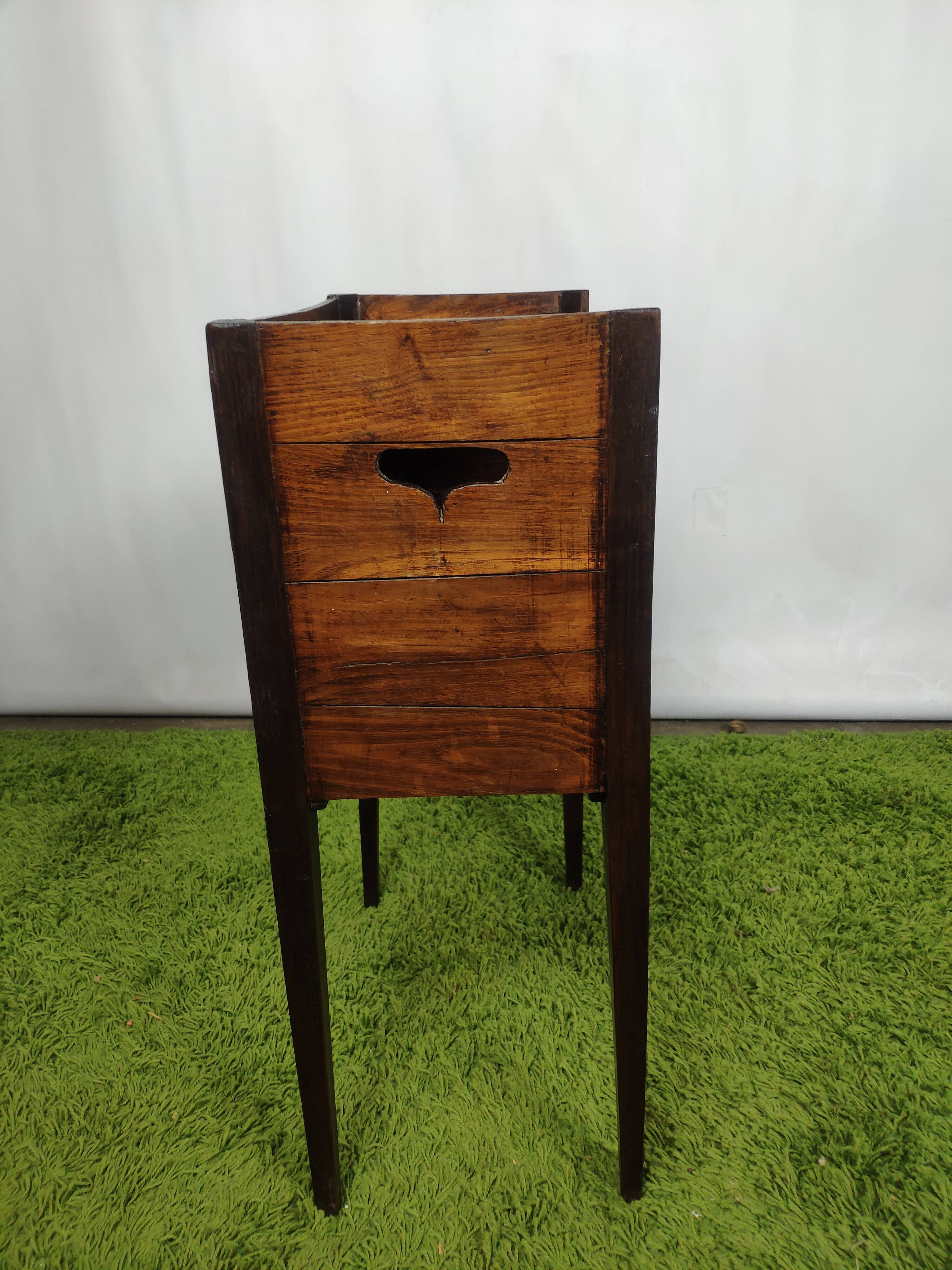 Old wooden bedside table