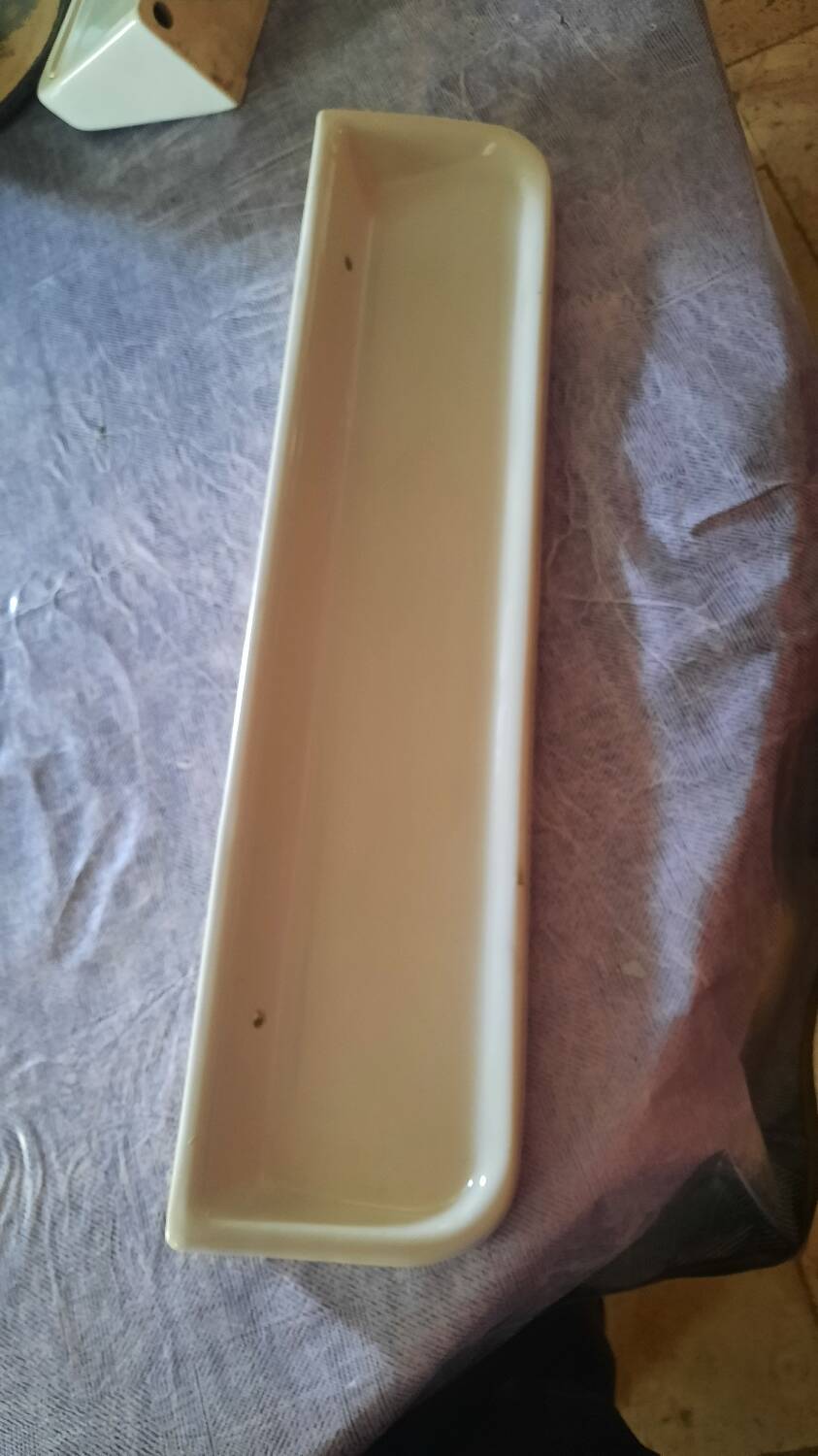 Porcelain bathroom shelf