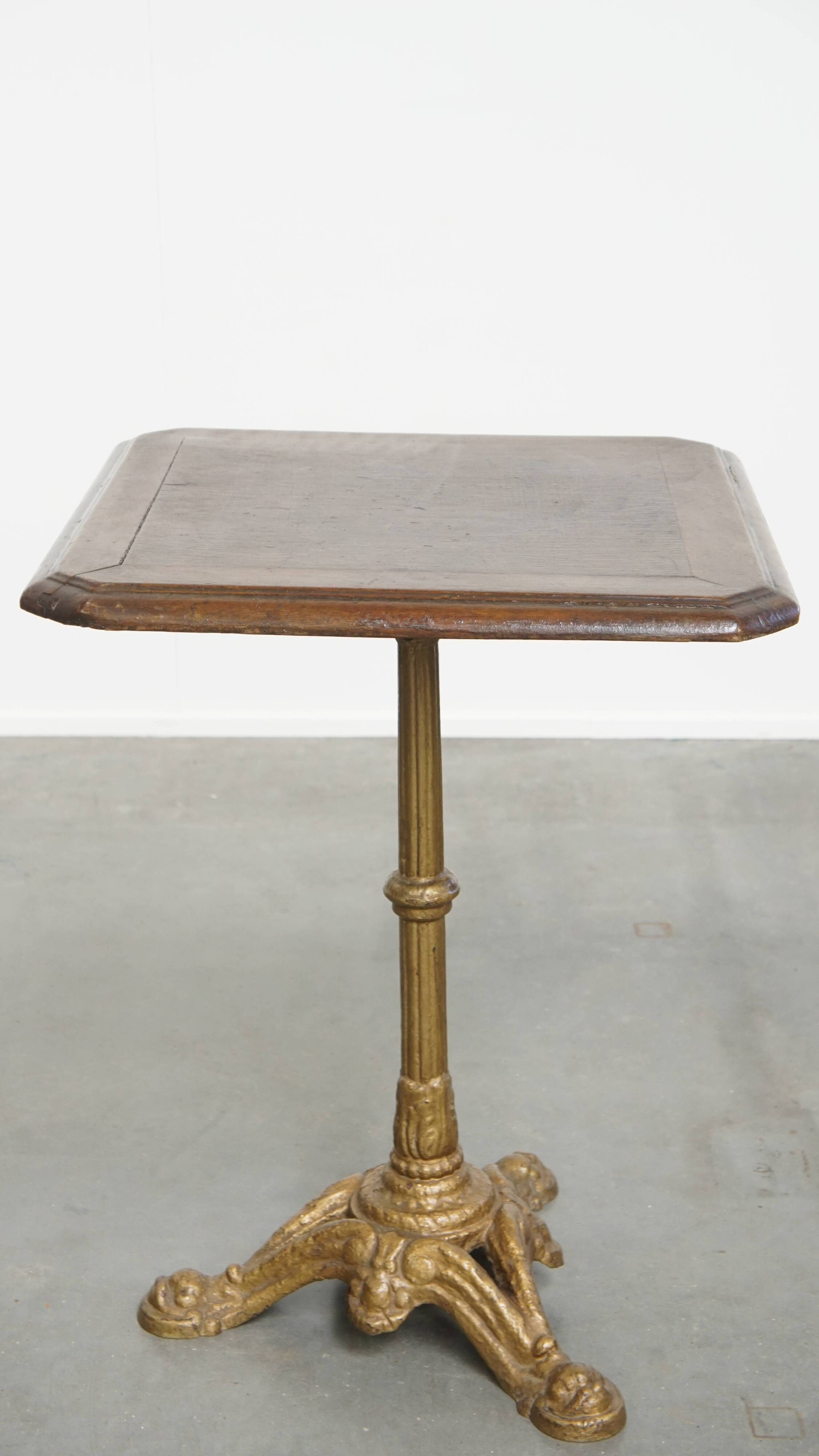 Antique Bistro Table with Gold-Colored Cast Iron Base and Dark Oak Top