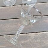11 bottle-bottom bistro glasses with silver edging, early 20th century