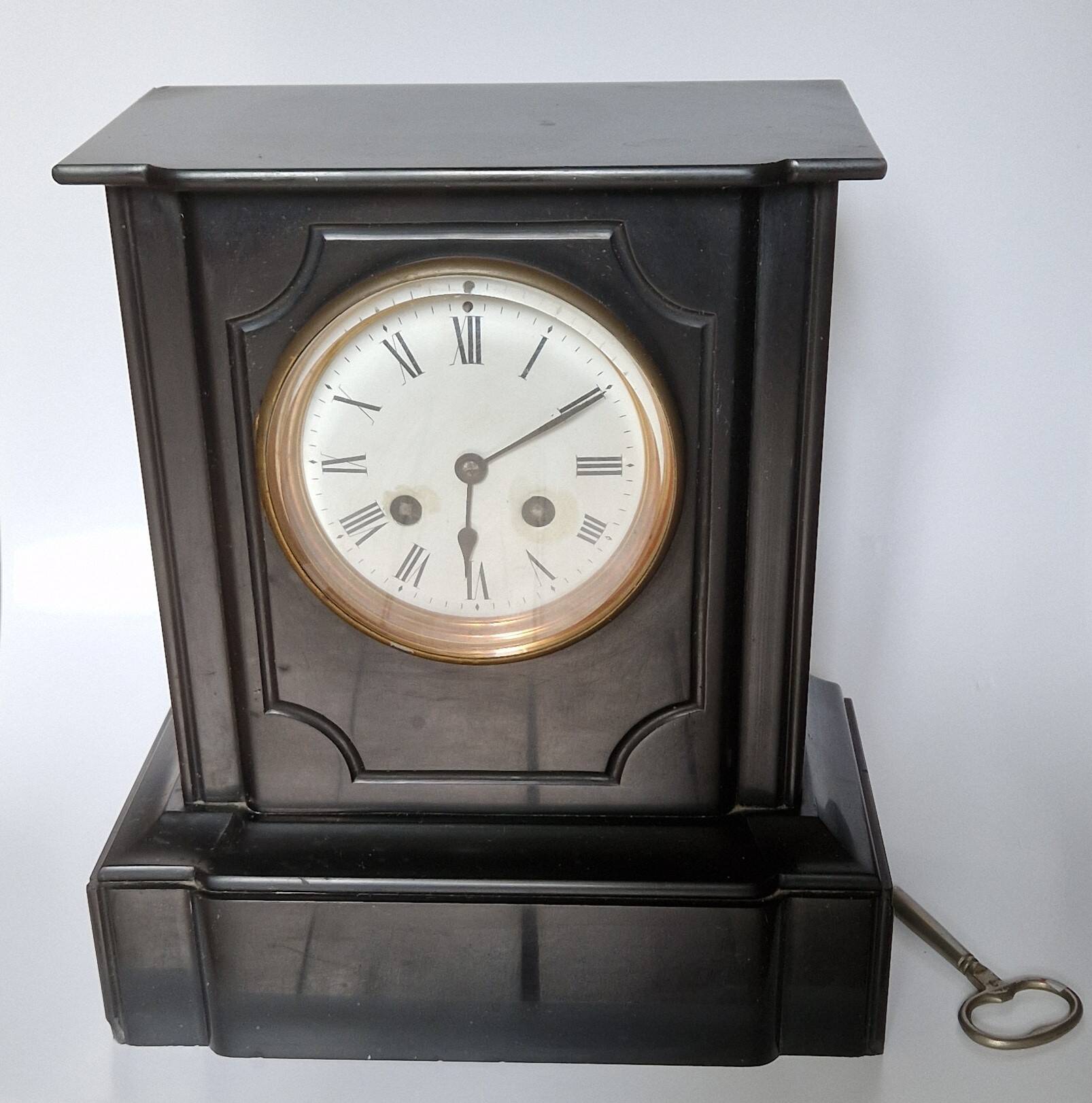 Napoleon III style black marble clock, in working condition