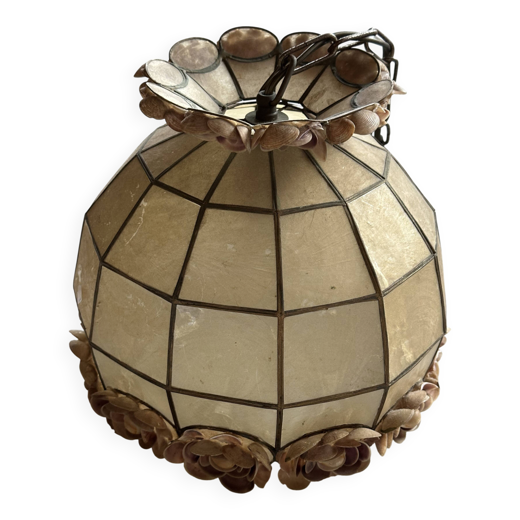 Vintage pendant light with a pearlescent shade and floral decoration.