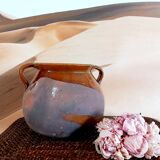 Old cauldron in pottery