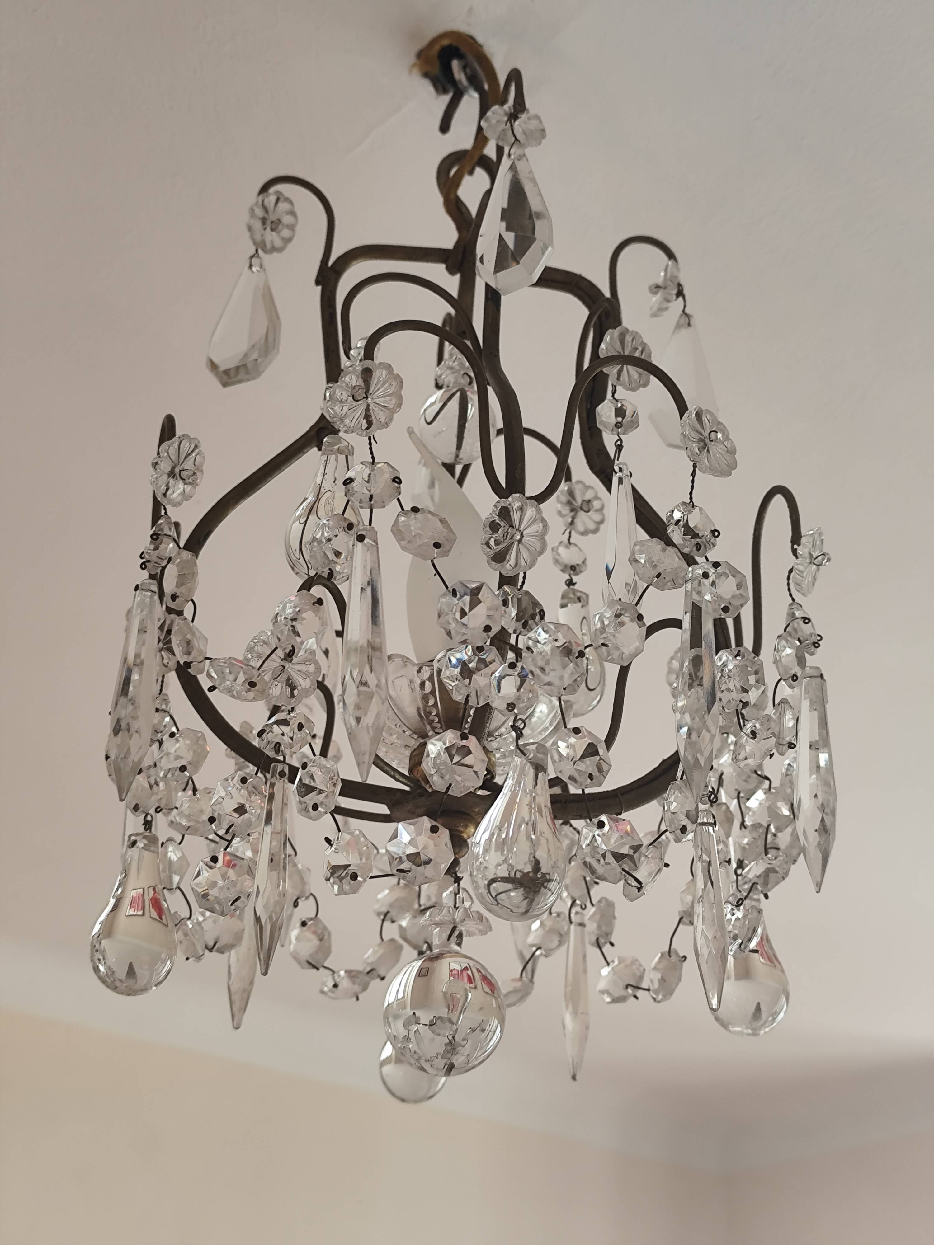 brass cage chandelier with crystal tassels
