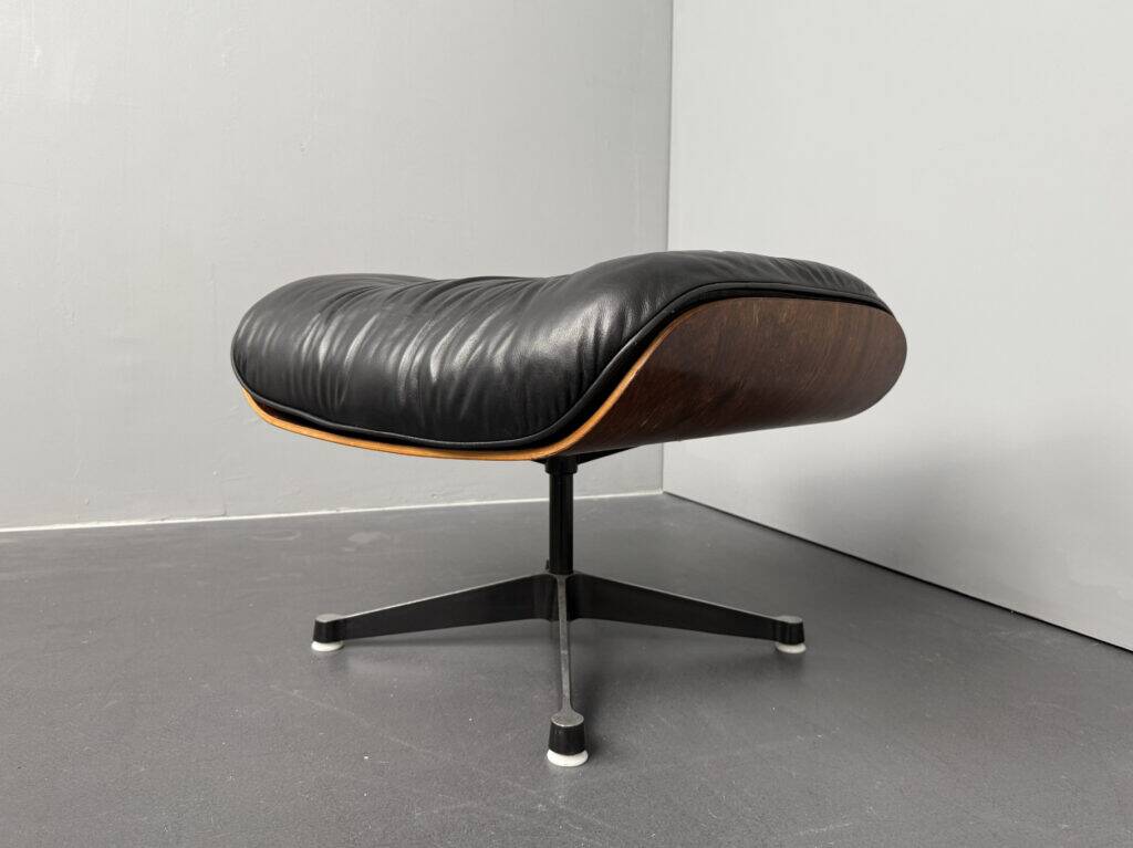 Black leather ottoman by Ray & Charles Eames for Herman Miller Vitra, Germany, 1980s.