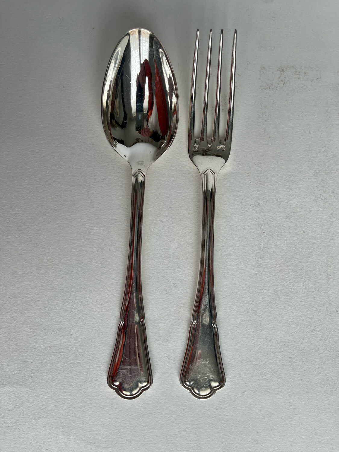 12 Ercuis silver-plated cutlery sets