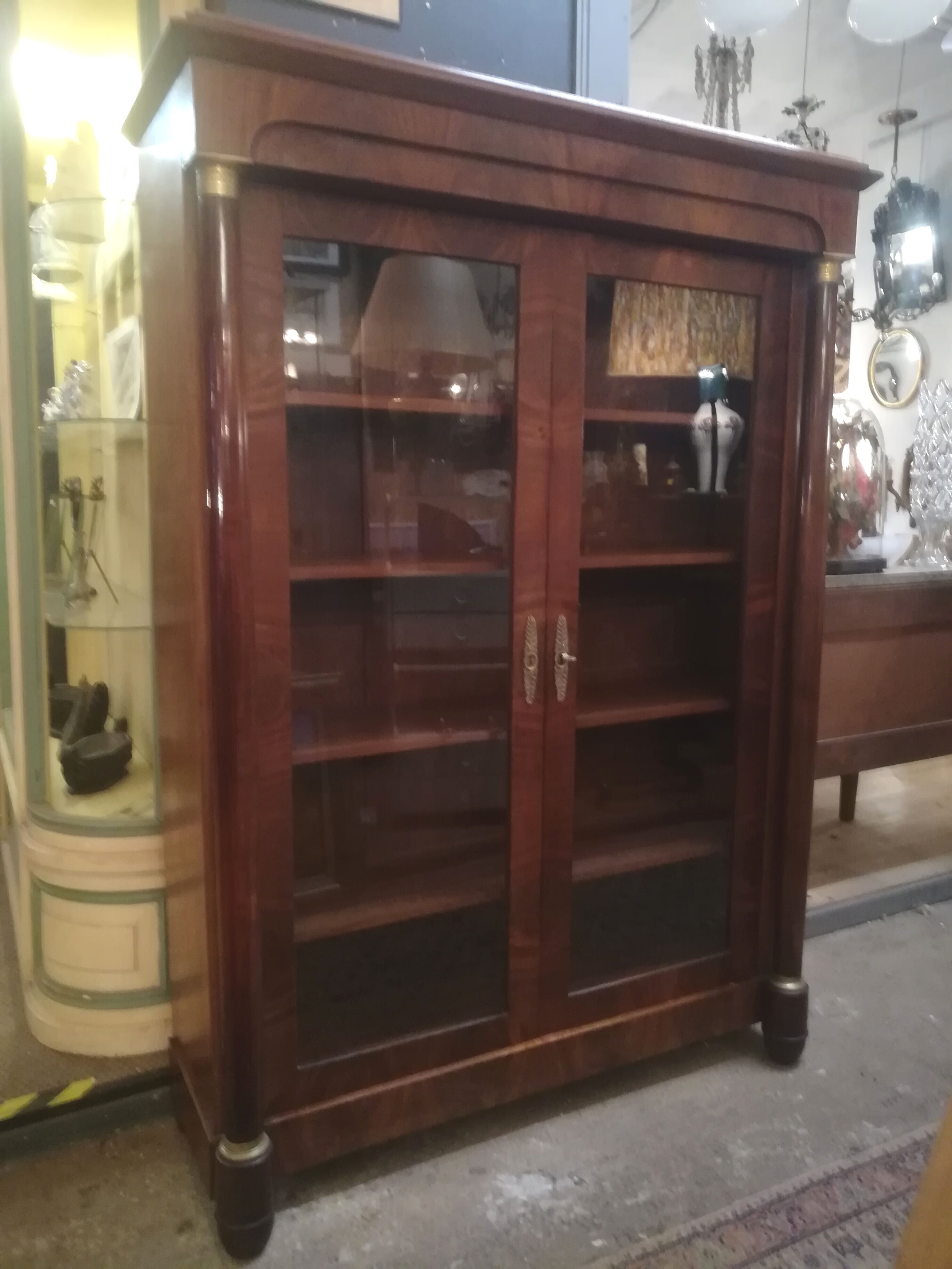 Empire style library in mahogany and bronze