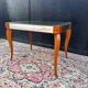 Small wooden coffee table with a mirror from the 1950s.