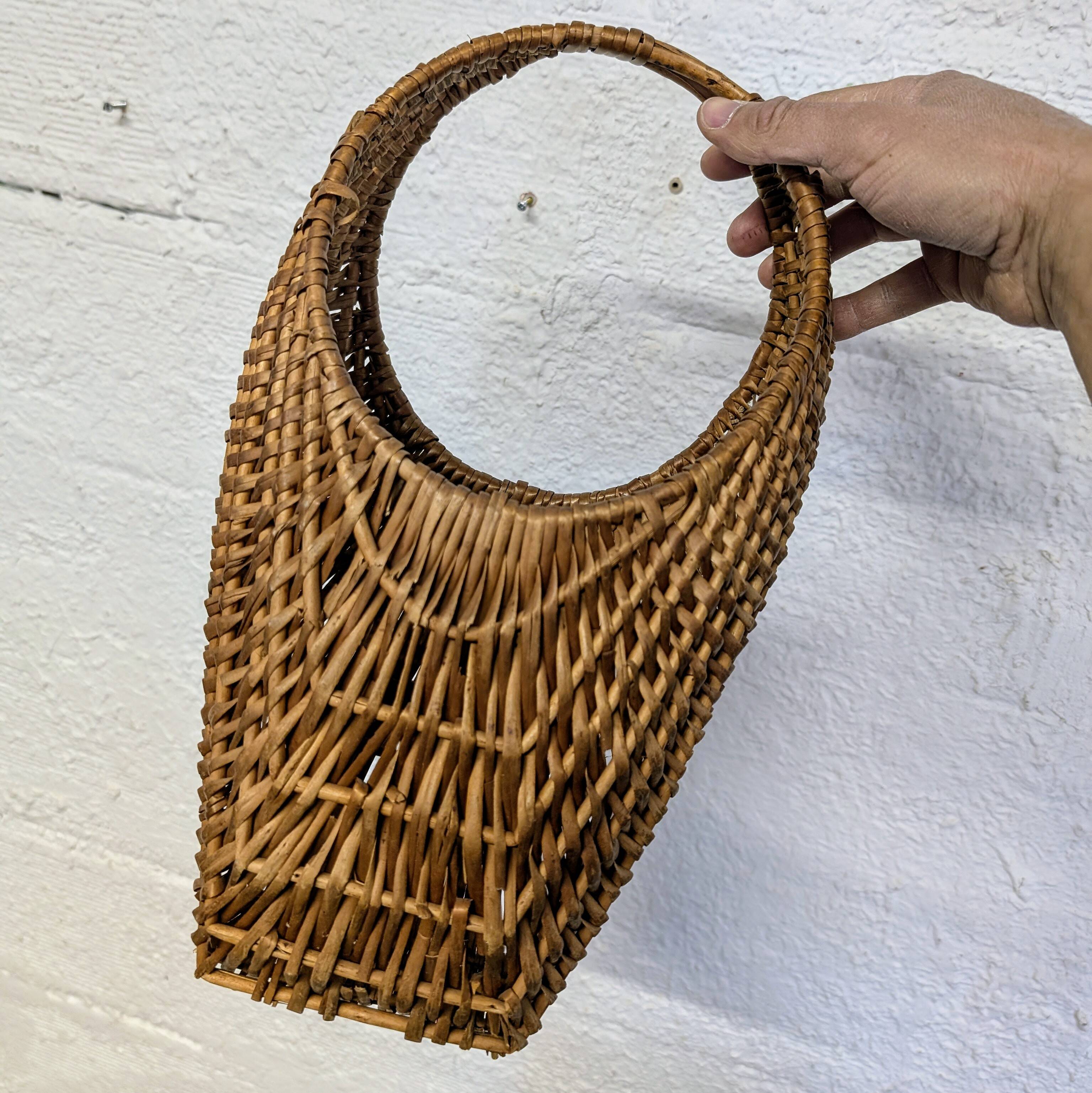 Large-handled woven wicker basket