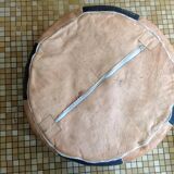 2 leather poufs