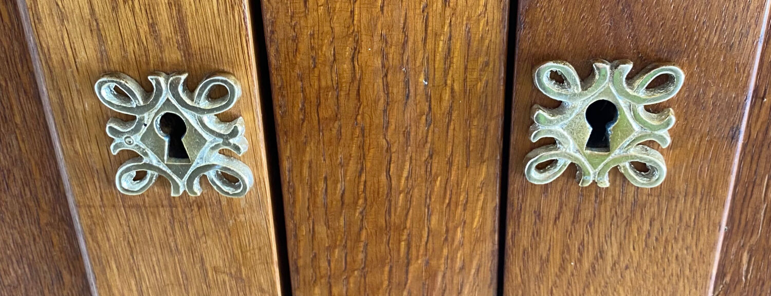 Vintage cupboard with compass feet