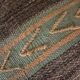Cushion cover in old Berber blanket.