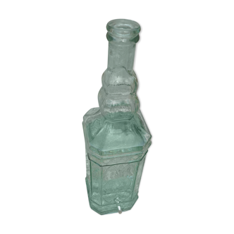 Square bottle of molded-pressed glass with faucet