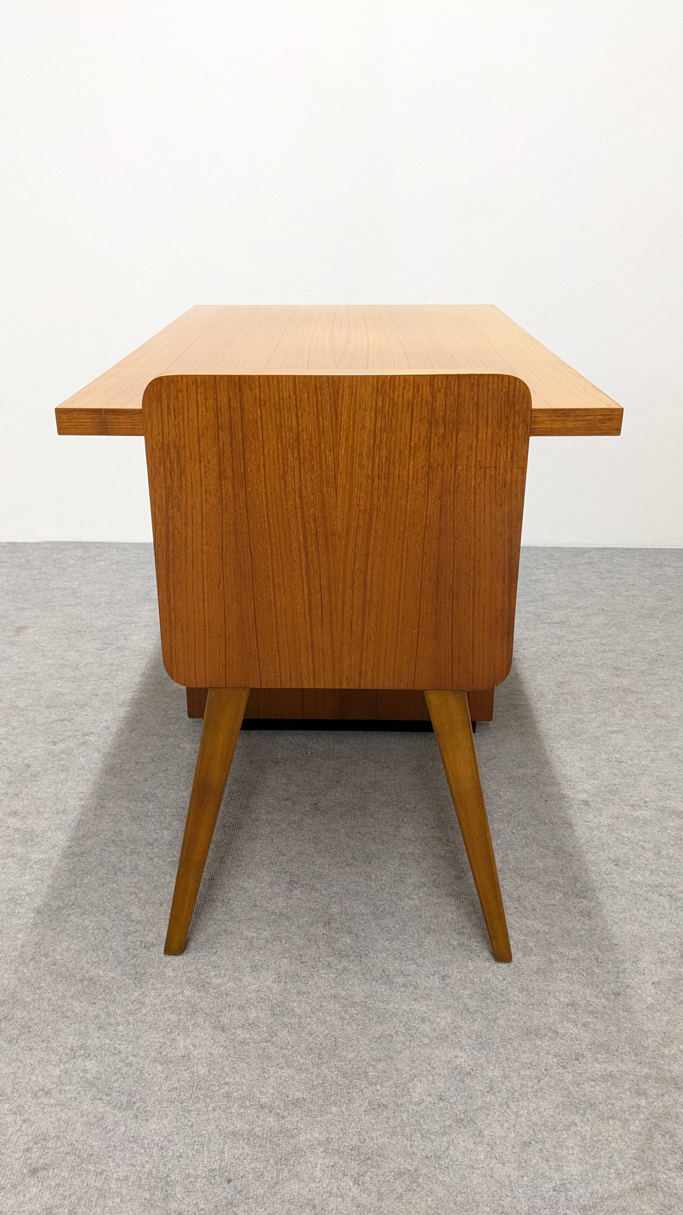 Modernist desk in blonde rosewood, France circa 1960.
