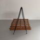 Mid-century black metal and wicker magazine rack, 1960, Germany