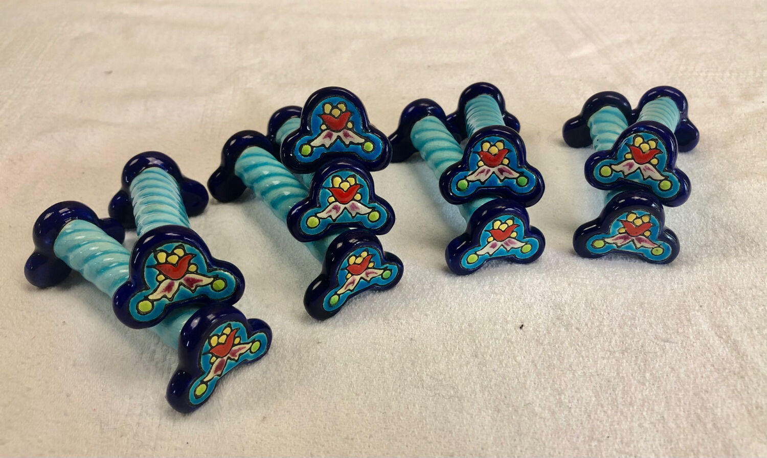 9 knife holders Enamels of Longwy