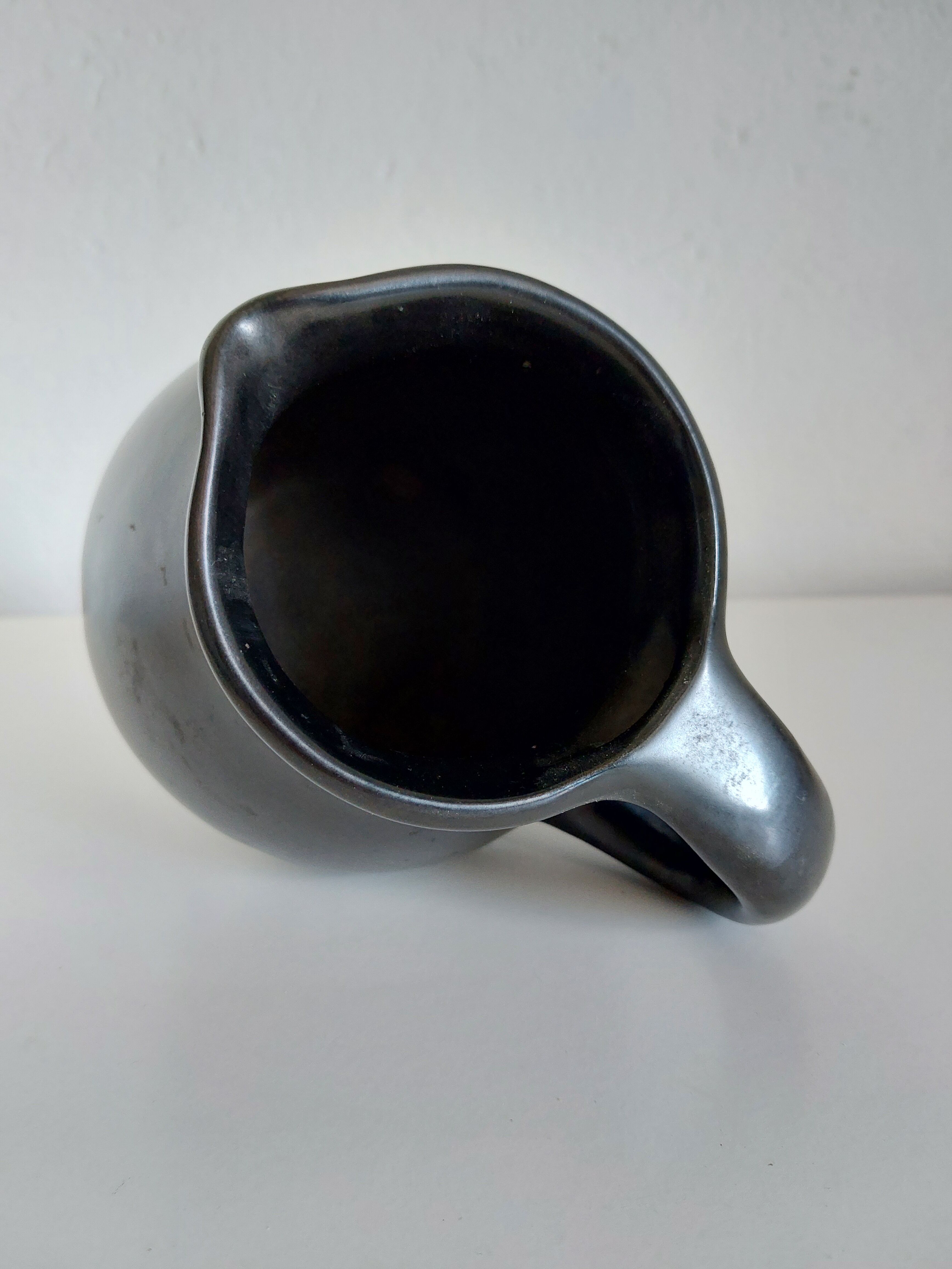 Vintage satin black tripod vase