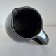 Vase tripode vintage noir satiné