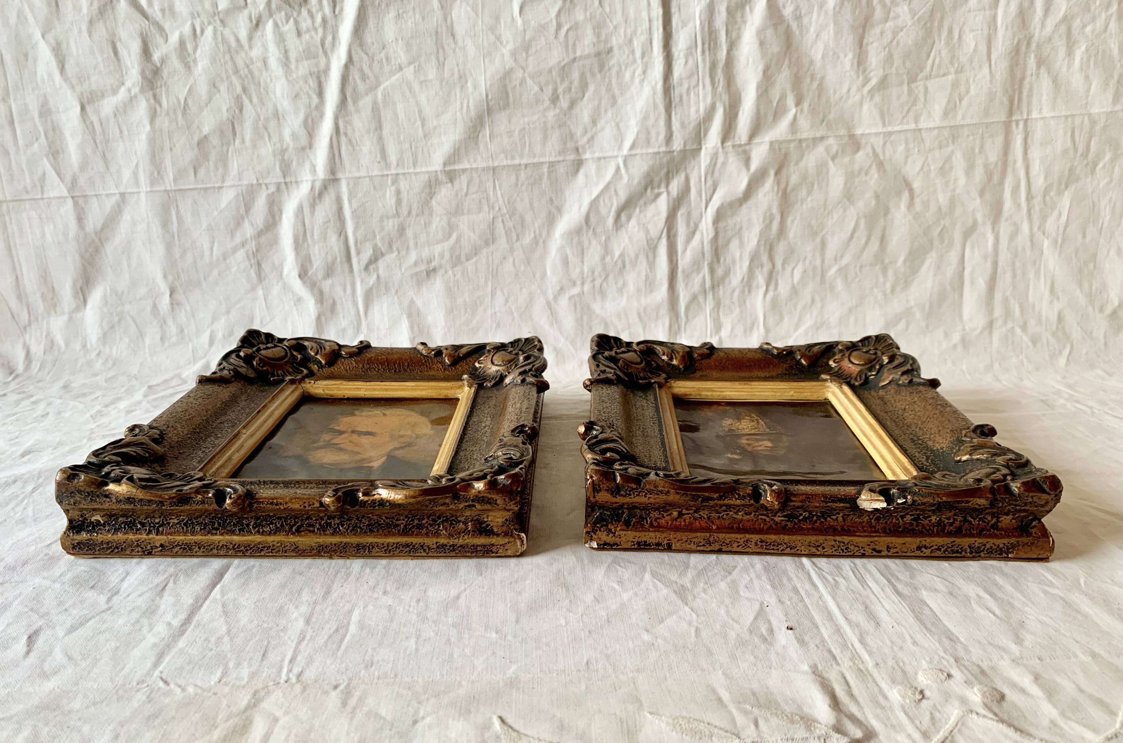 Pair of old carved wooden and plaster frames