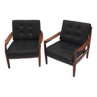 Pair of Danish leather and teak armchairs