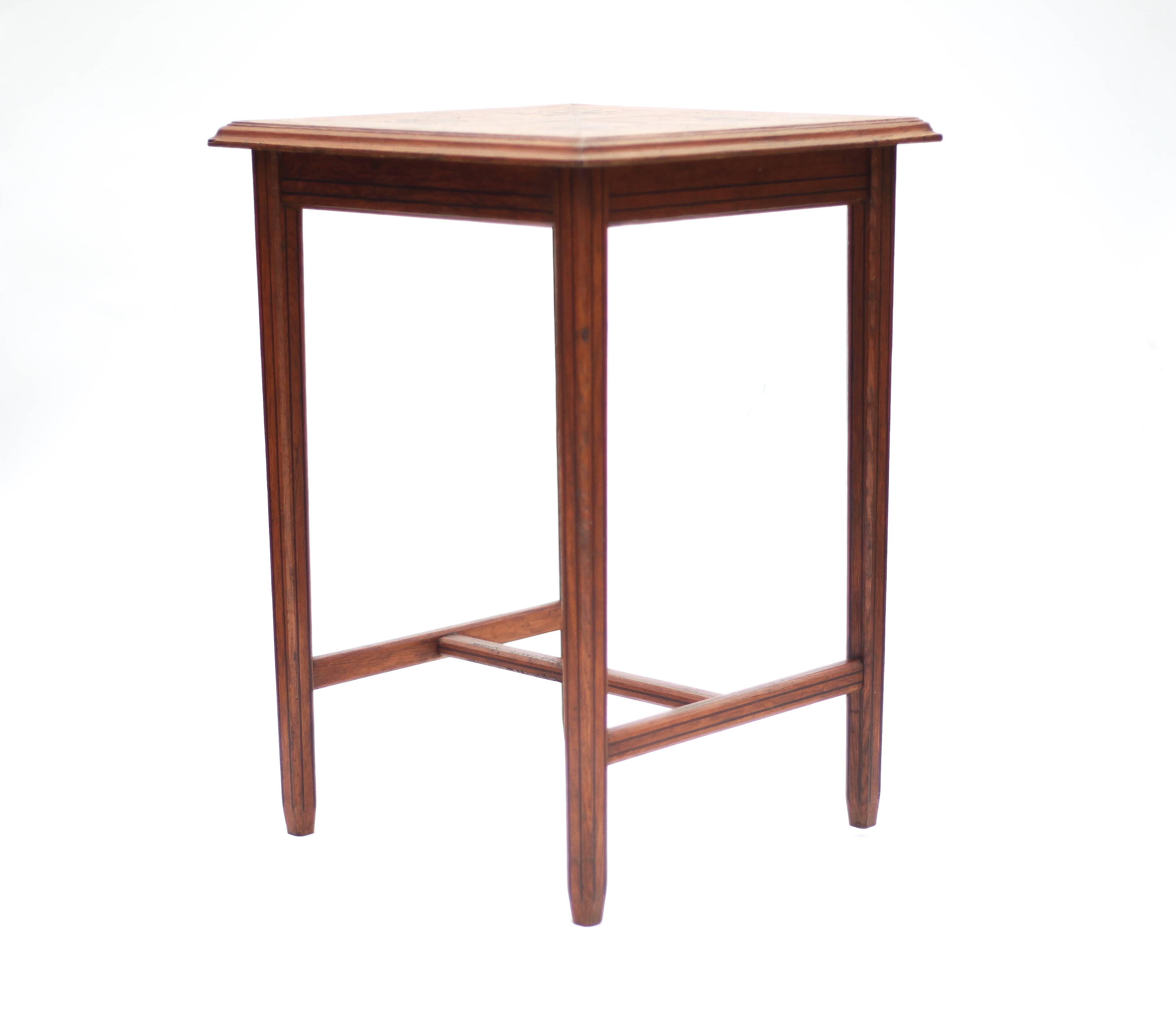 Wood table with marquetry, table with an antique parquet top, antique table.