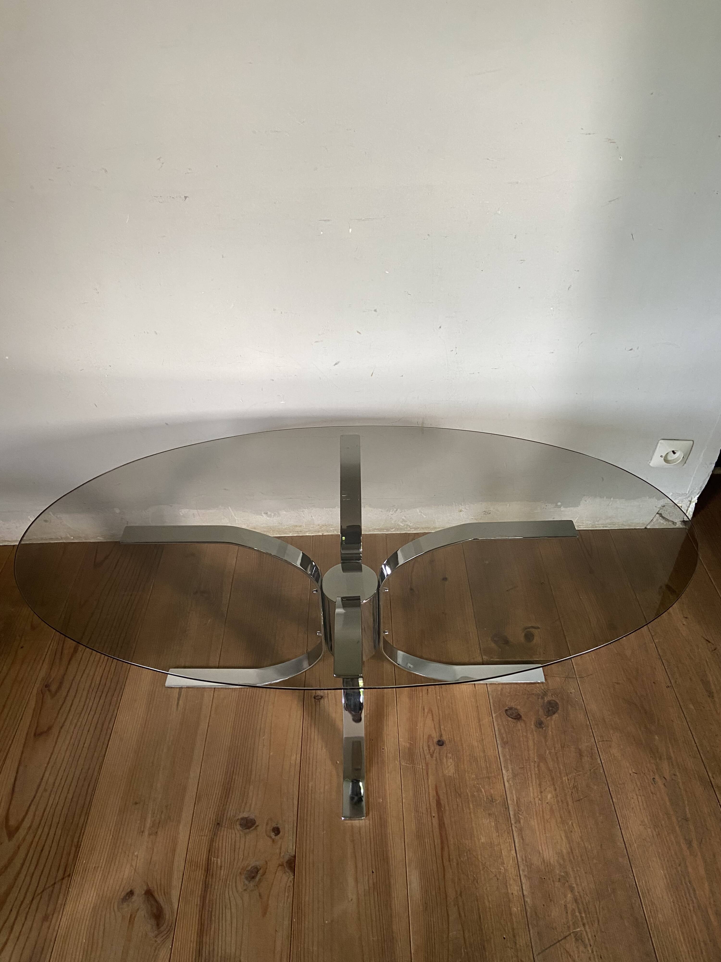 Modernist chrome and smoked glass table with tulip base from the 70s