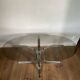 Modernist chrome and smoked glass table with tulip base from the 70s