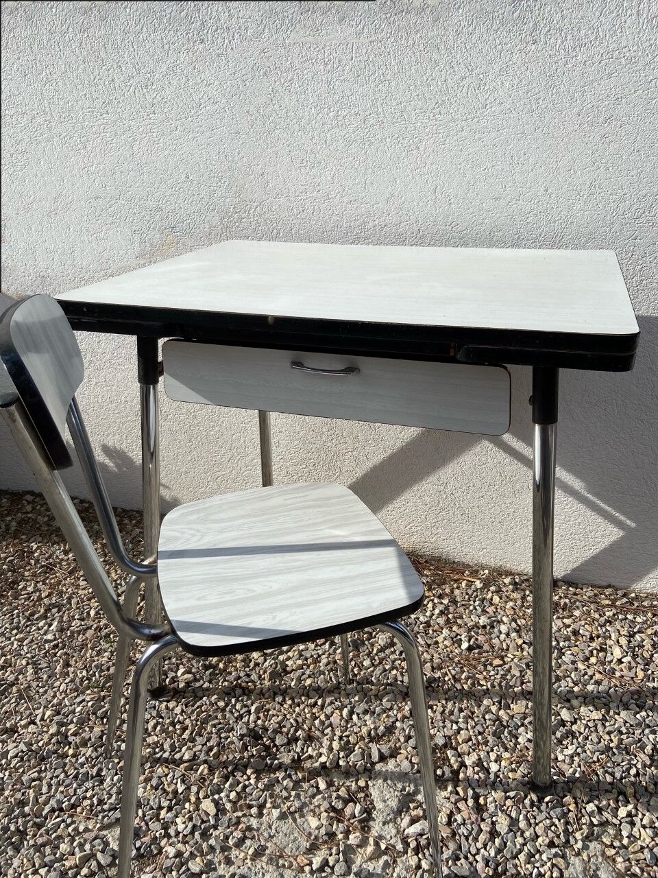 White formica table with chair