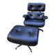 Charles Eames all-black lounge chair and ottoman, Herman Miller edition