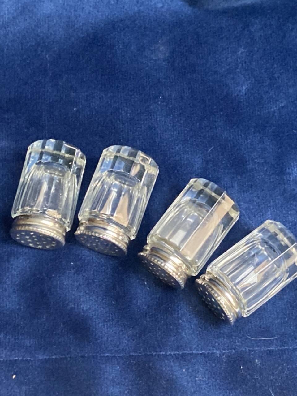 Individual salt shakers in 800 silver with two hallmarks and fluted crystal