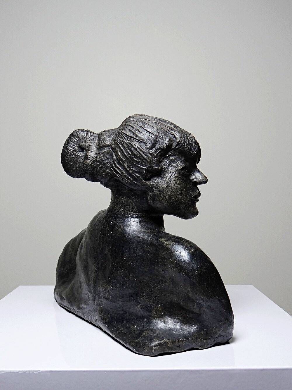 20th-century ceramic bust of a woman, an unidentified piece of art.