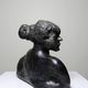 20th-century ceramic bust of a woman, an unidentified piece of art.