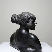 20th-century ceramic bust of a woman, an unidentified piece of art.