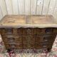 Commode époque Louis XV en noyer massif à poignée coquilles sculptées