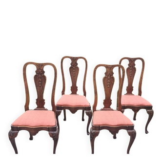 Set of 4 carved wooden chairs from the late 19th century in the Dutch style.