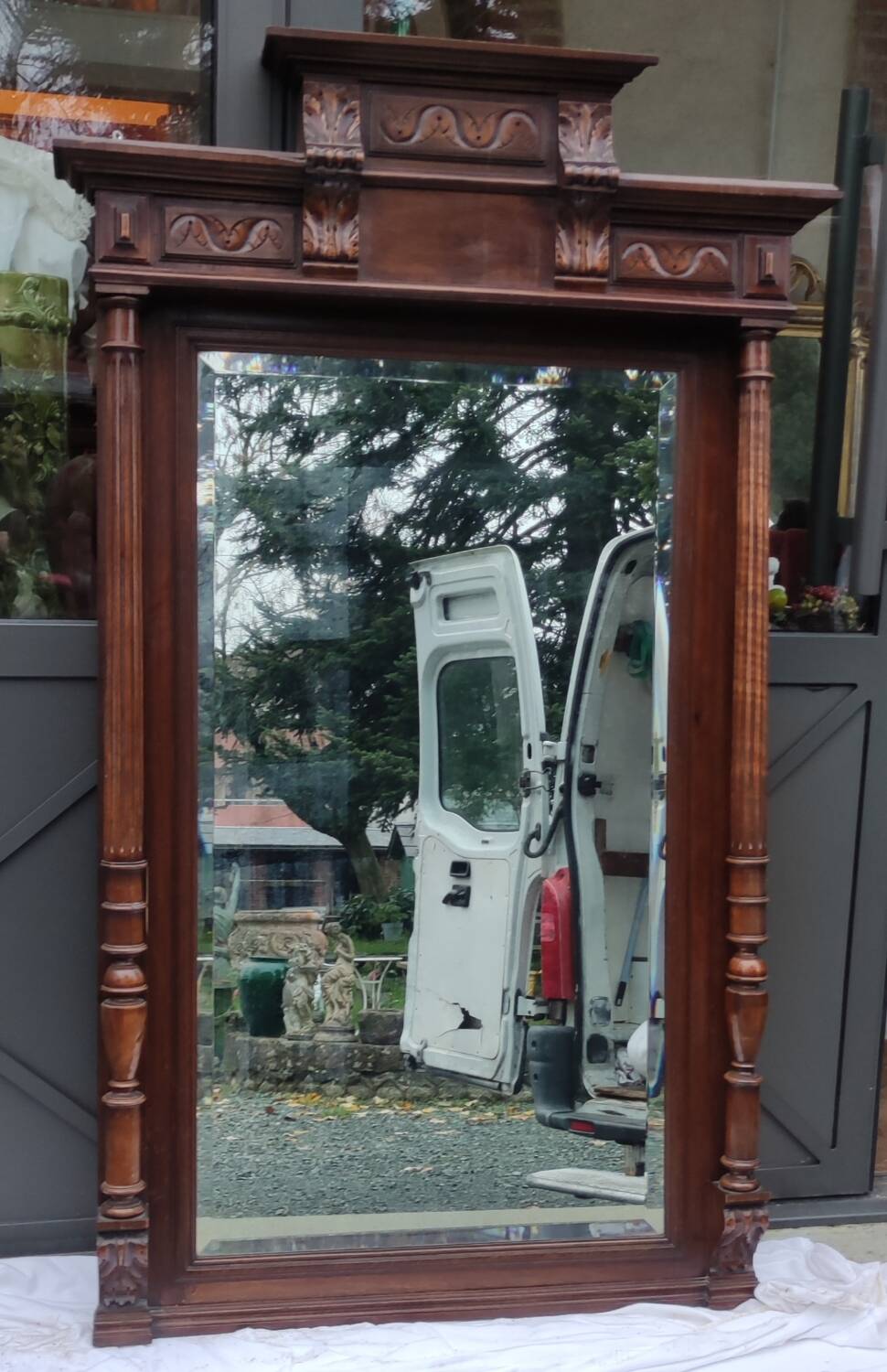 Old large carved wooden mirror