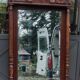 Old large carved wooden mirror