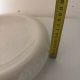 Empty pocket, cracked ceramic dish 1980