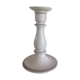 Old white earthenware candlestick