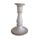 Old white earthenware candlestick