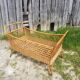 Former cradle bed baby rotin curved on vintage 60s roulettes