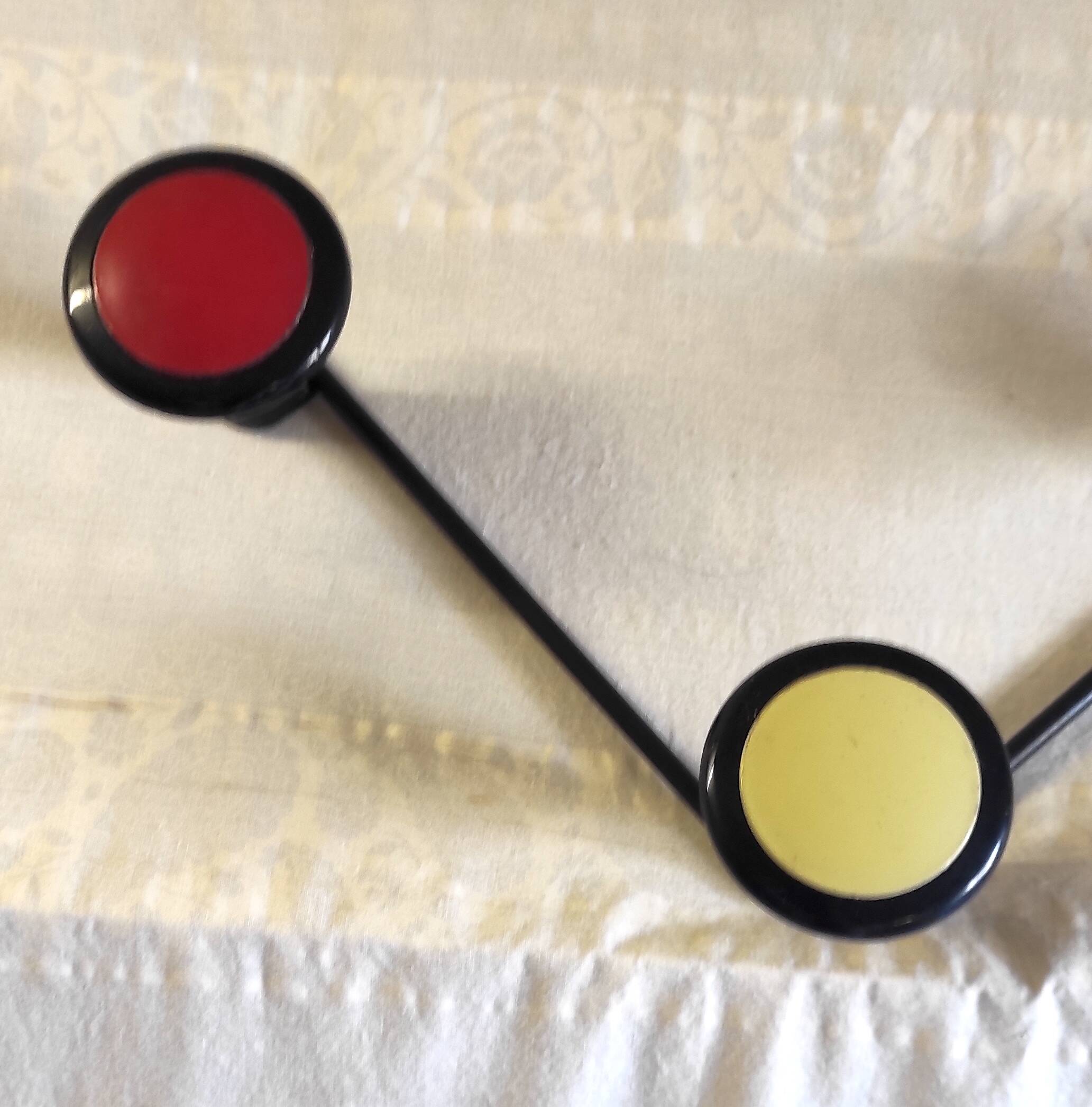 Tri-colour wall coat rack design - 1950s/60s