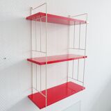 Mid century wall shelf in red and white in the string design, narrow modular hanging shelf
