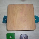Wooden game stacking geometric shapes